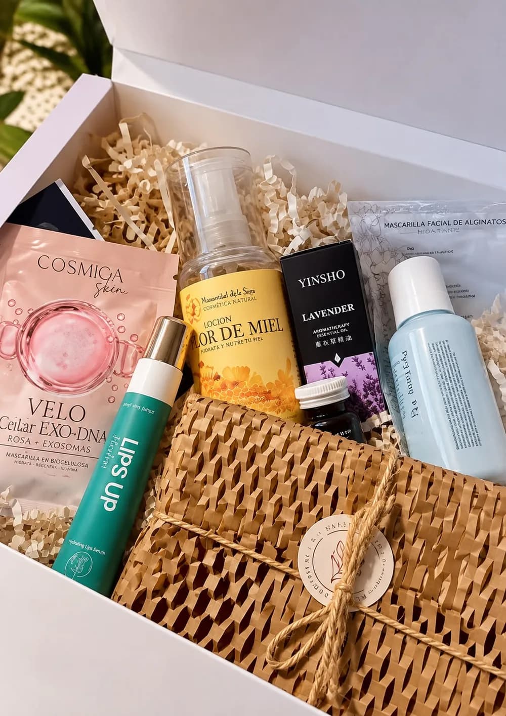 Caja de bienvenida del programa Inner Circle con productos de belleza y bienestar